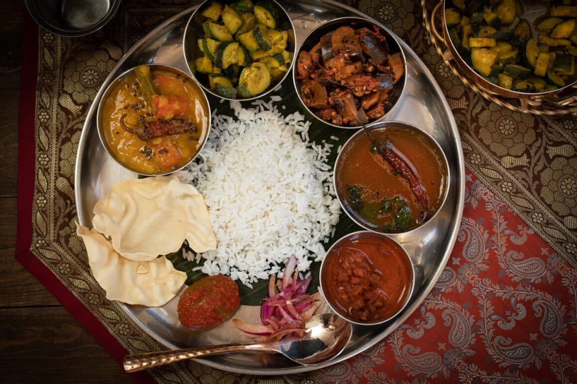 South Indian vegan thali platter with a variety of dishes