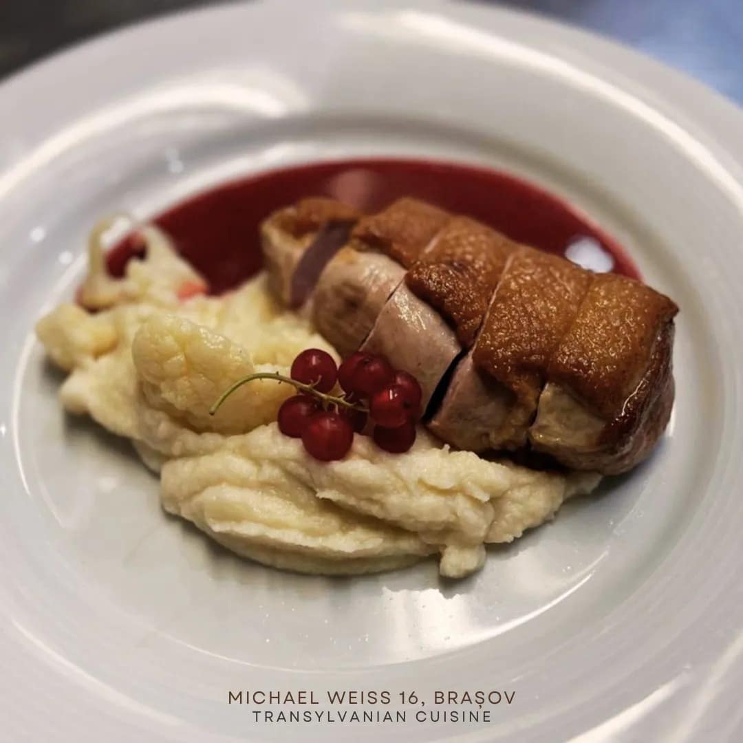 pan-fried duck breast comes with cauliflower purée and a redcurrant sauce.